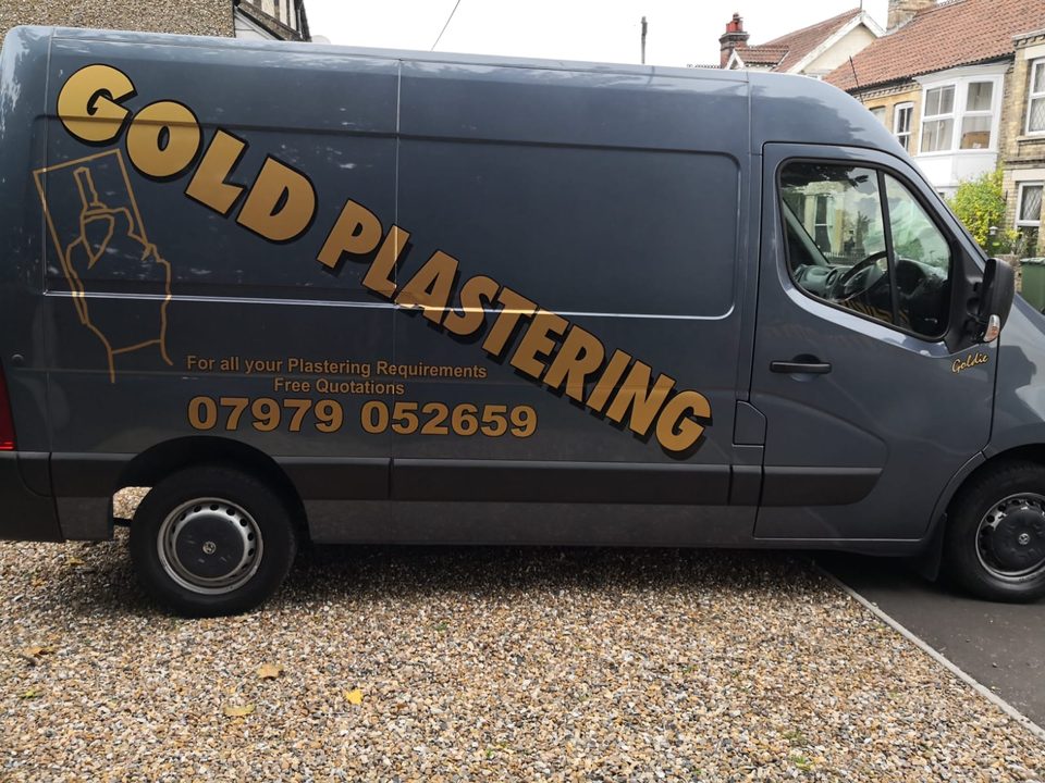 Side of the Gold Plastering van with gold lettering and the phone number 07979 052659.